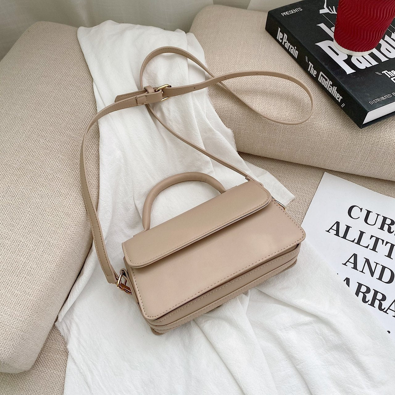 Retro texturerad enfärgad enkel handhållen mångsidig axelväska