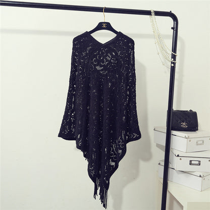 Stickad virkad ihålig oregelbunden tröja med tofsar för kvinnor