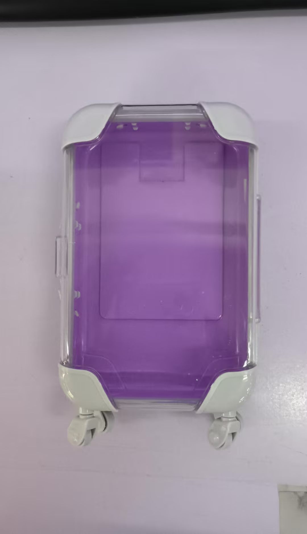 Barnens enkla tecknade mini-resväskeformade förvaringslåda