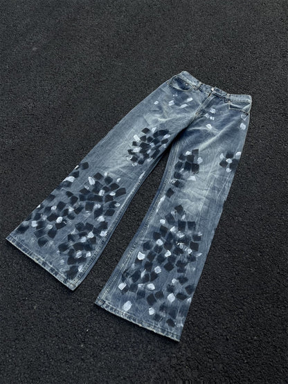 Lätt utsvängda jeans med vida ben, lösa herrbyxor