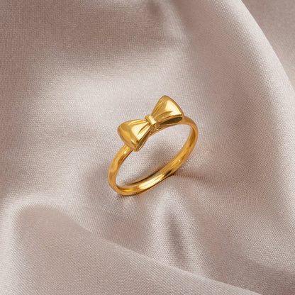 Japansk och koreansk design med utsökt rosett i 18K guld, ny ring