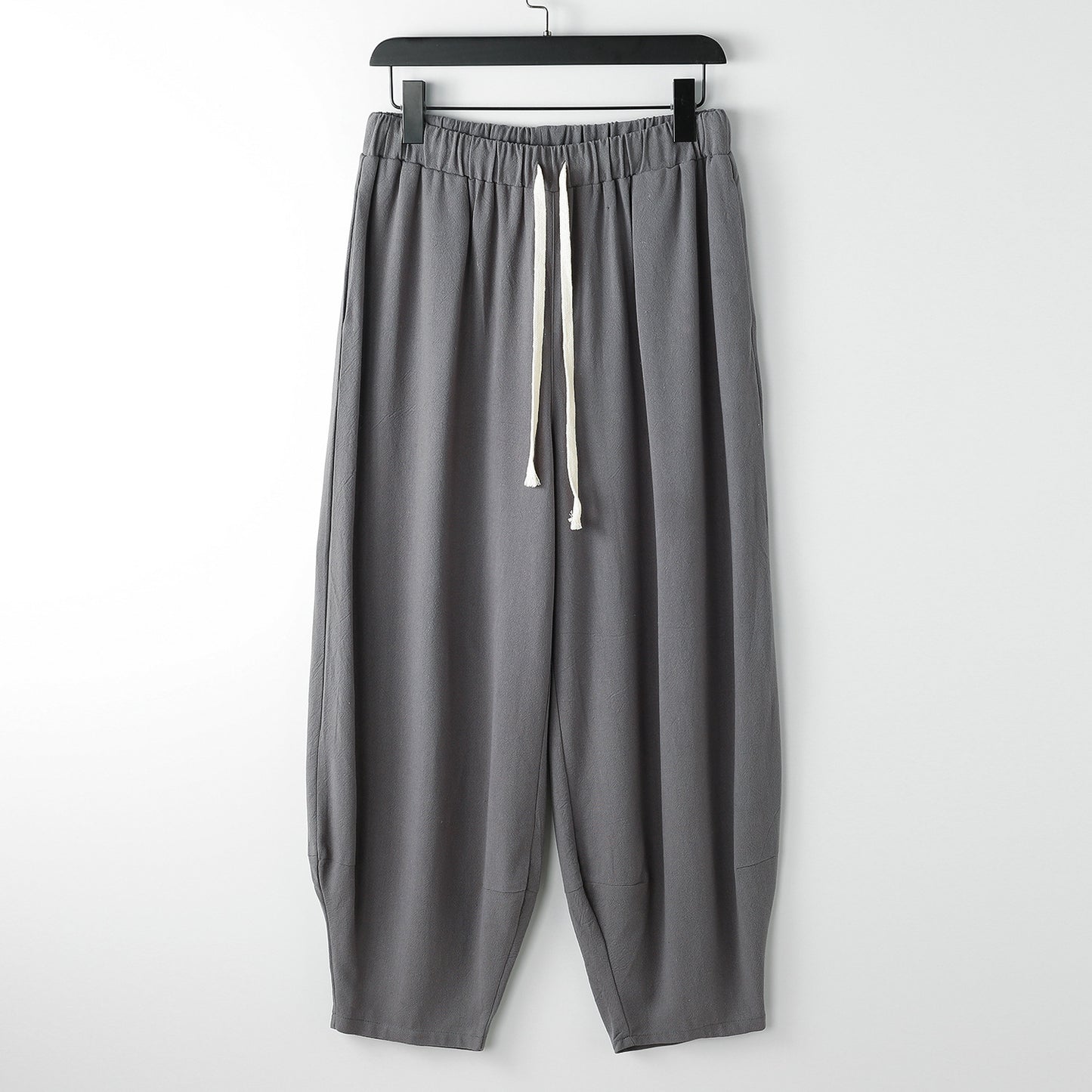 Lösa harembyxor med knutna ben för överviktiga män