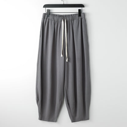 Lösa harembyxor med knutna ben för överviktiga män