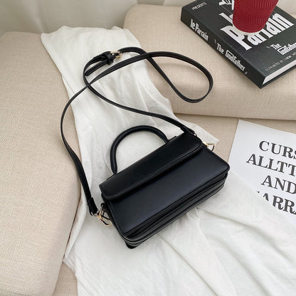 Retro texturerad enfärgad enkel handhållen mångsidig axelväska