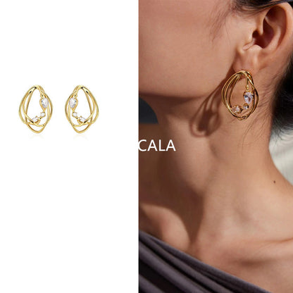 Europeiska och amerikanska nischörhängen med metallisk design, stereo oregelbundna örhängen