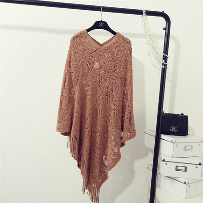 Stickad virkad ihålig oregelbunden tröja med tofsar för kvinnor